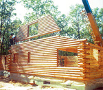 Pre-assembled Walls  End Being Set with a Crane